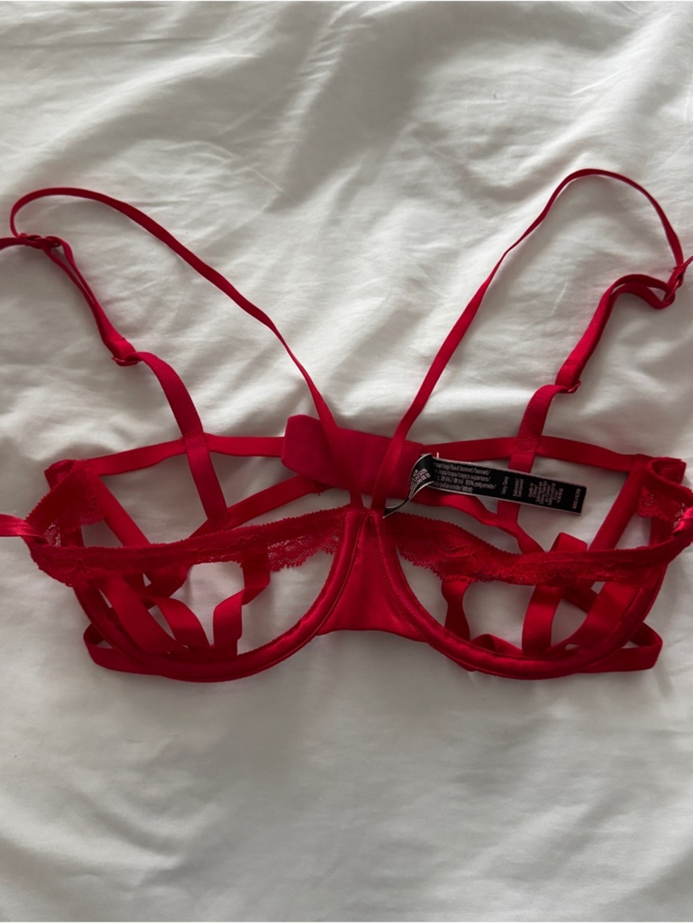 Red strappy lace balconette bra from Victoria’s Secret / PINK 32C